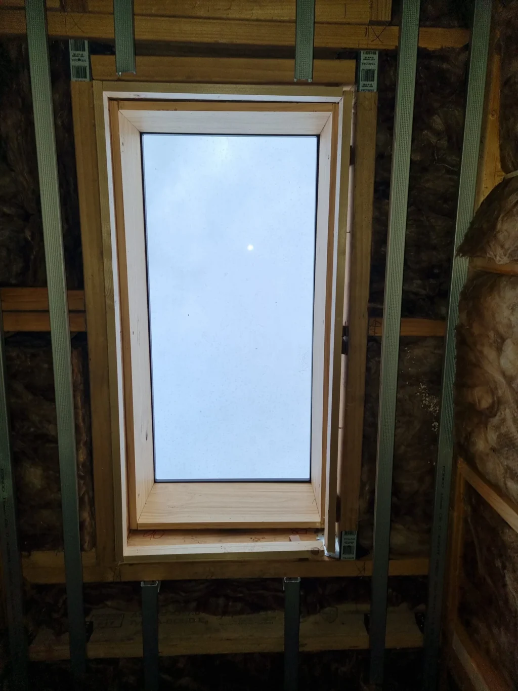 Skylight installation in an attic.